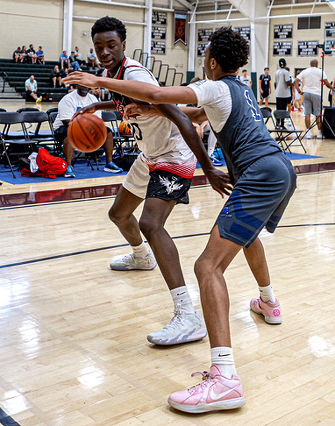 Miracle Oruchukwu handling the ball against a defender